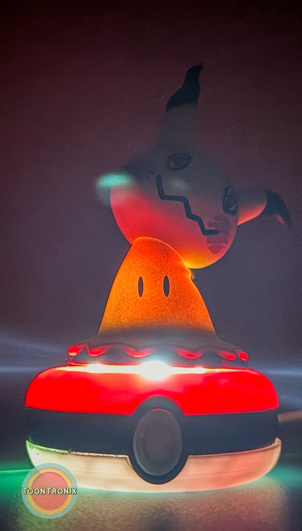 3" Mimikyu Pokemon statue USB desk lamp glowing on a Pokeball base