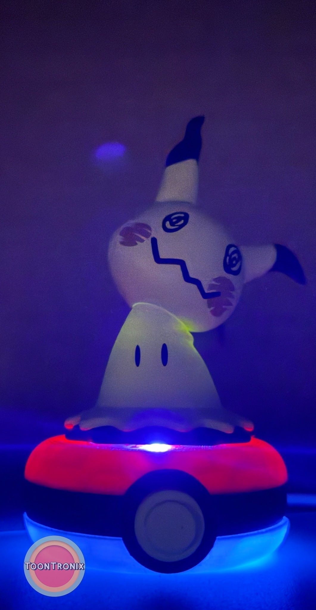 3" Mimikyu Pokemon statue USB desk lamp glowing on a Pokeball base