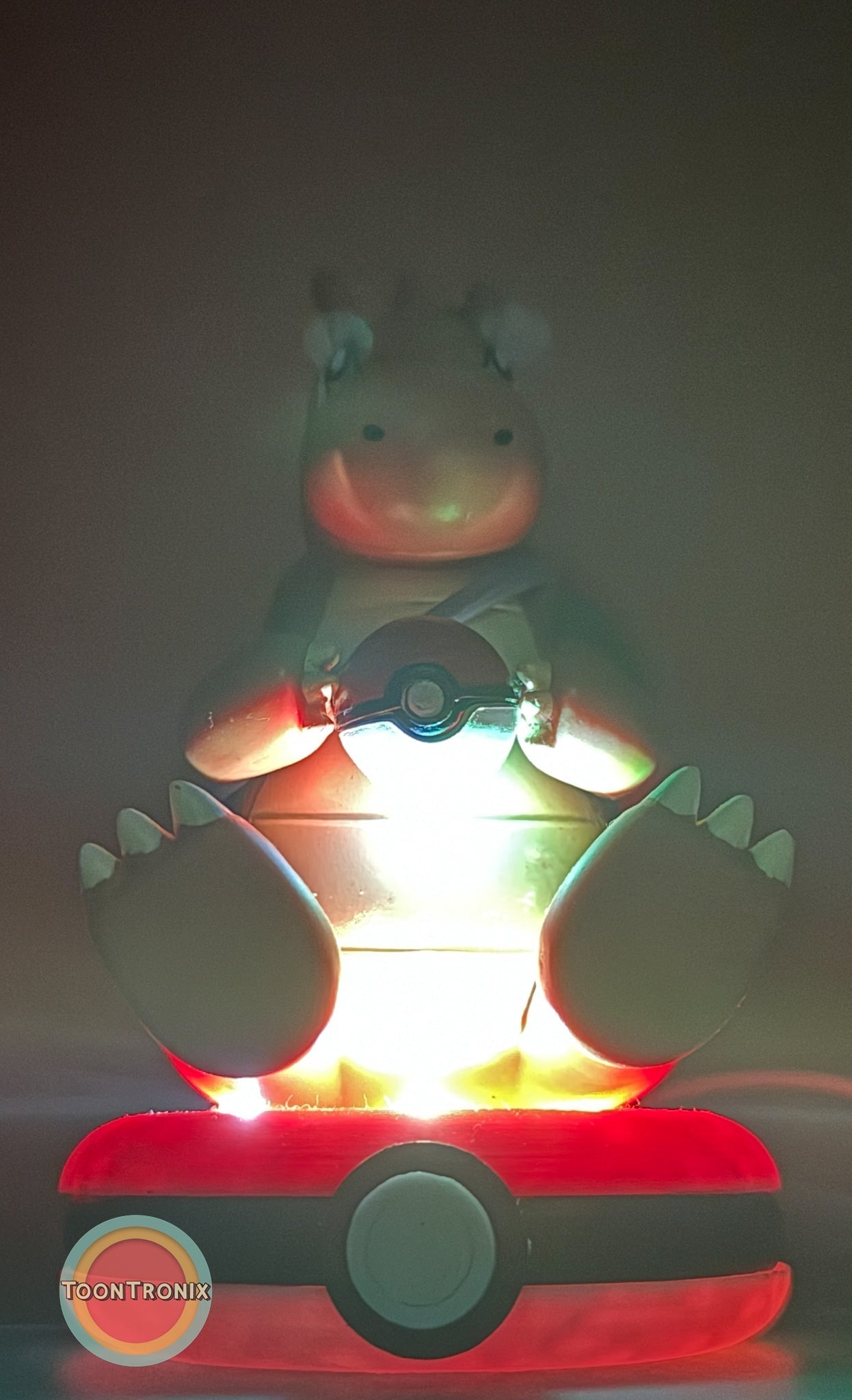 5" Dragonite Pokemon statue USB desk lamp glowing with multicolor light on Pokeball base