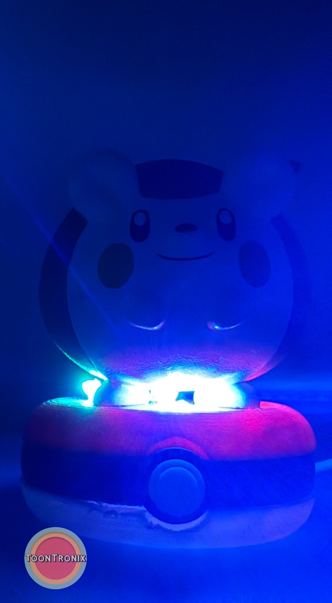 3" Togedemaru Pokemon statue USB desk lamp glowing with blue light on a Pokeball base