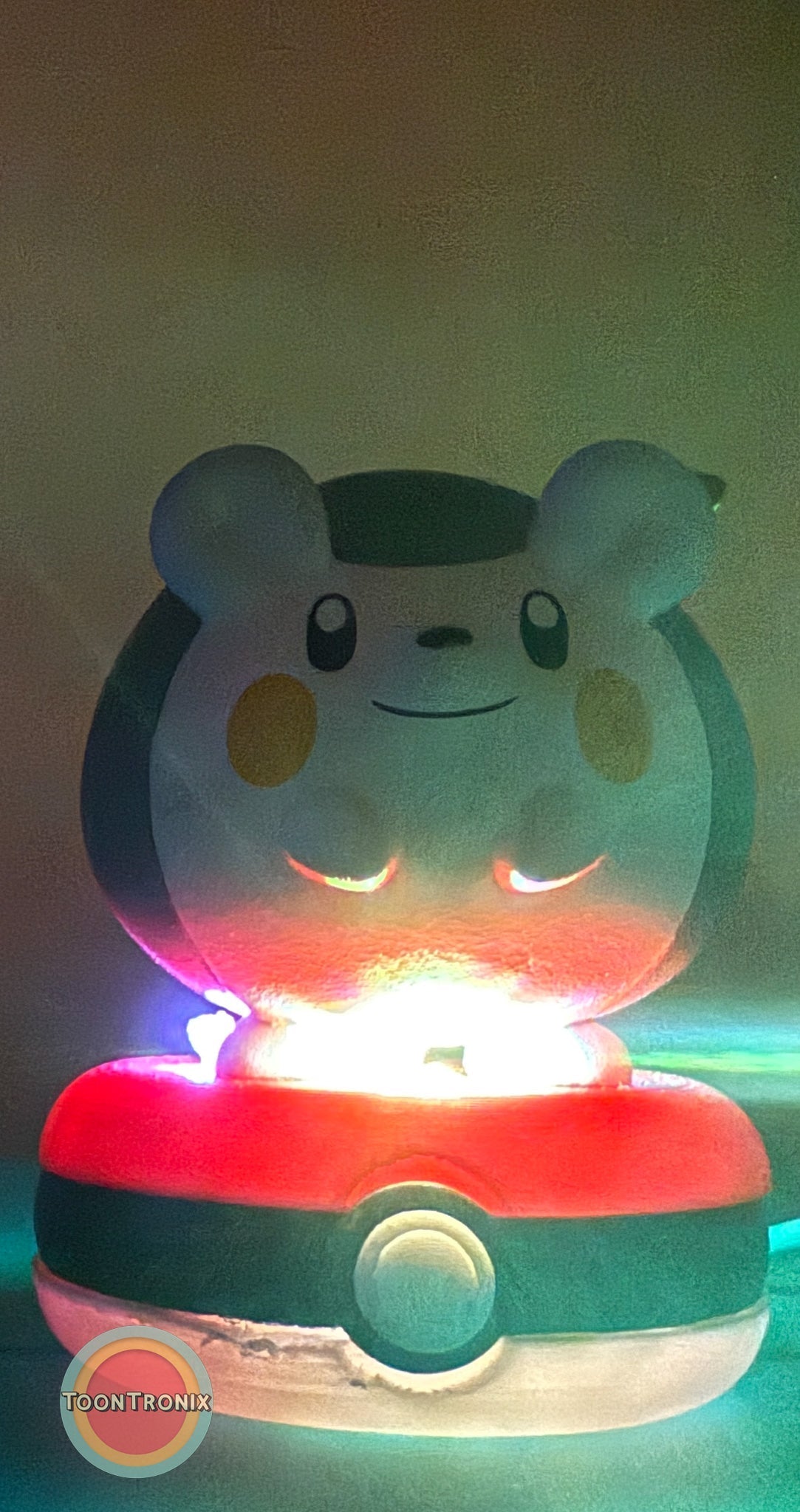 3" Togedemaru Pokemon statue USB desk lamp glowing on a Pokeball base