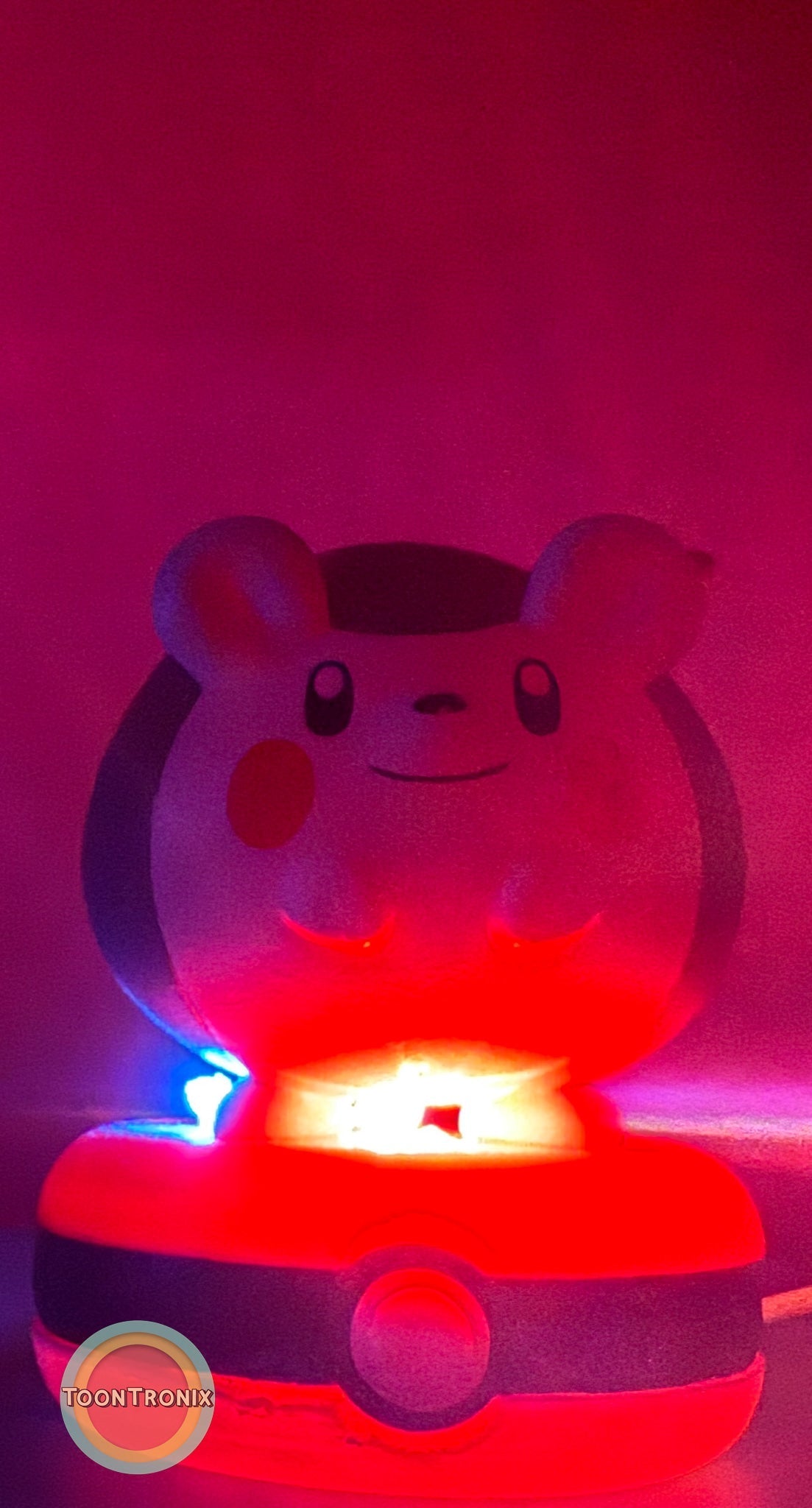 3" Togedemaru Pokemon statue USB desk lamp glowing with red and blue light on a Pokeball base