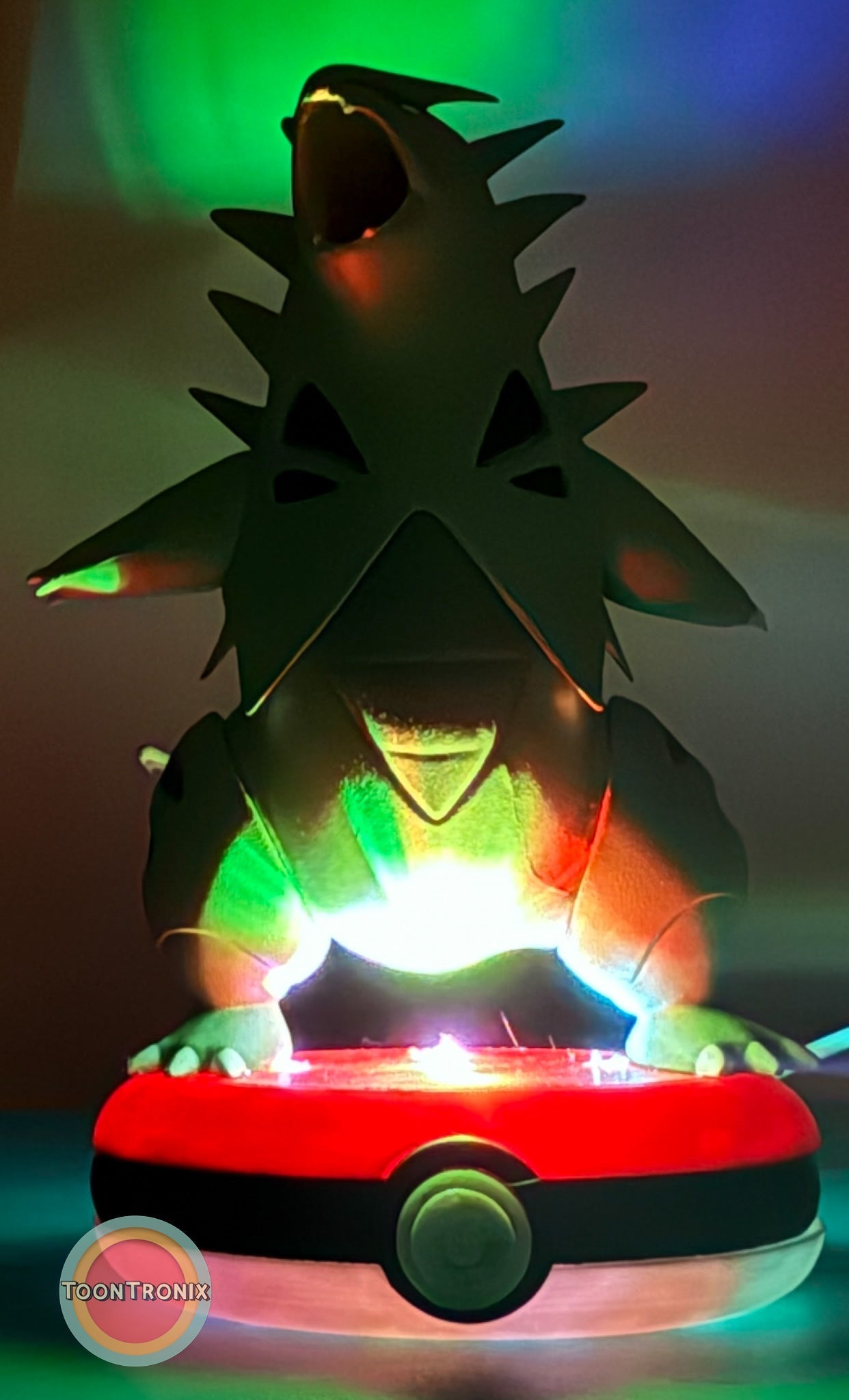 5" Tyranitar Desk Lamp with USB cord and colorful glowing Pokeball base