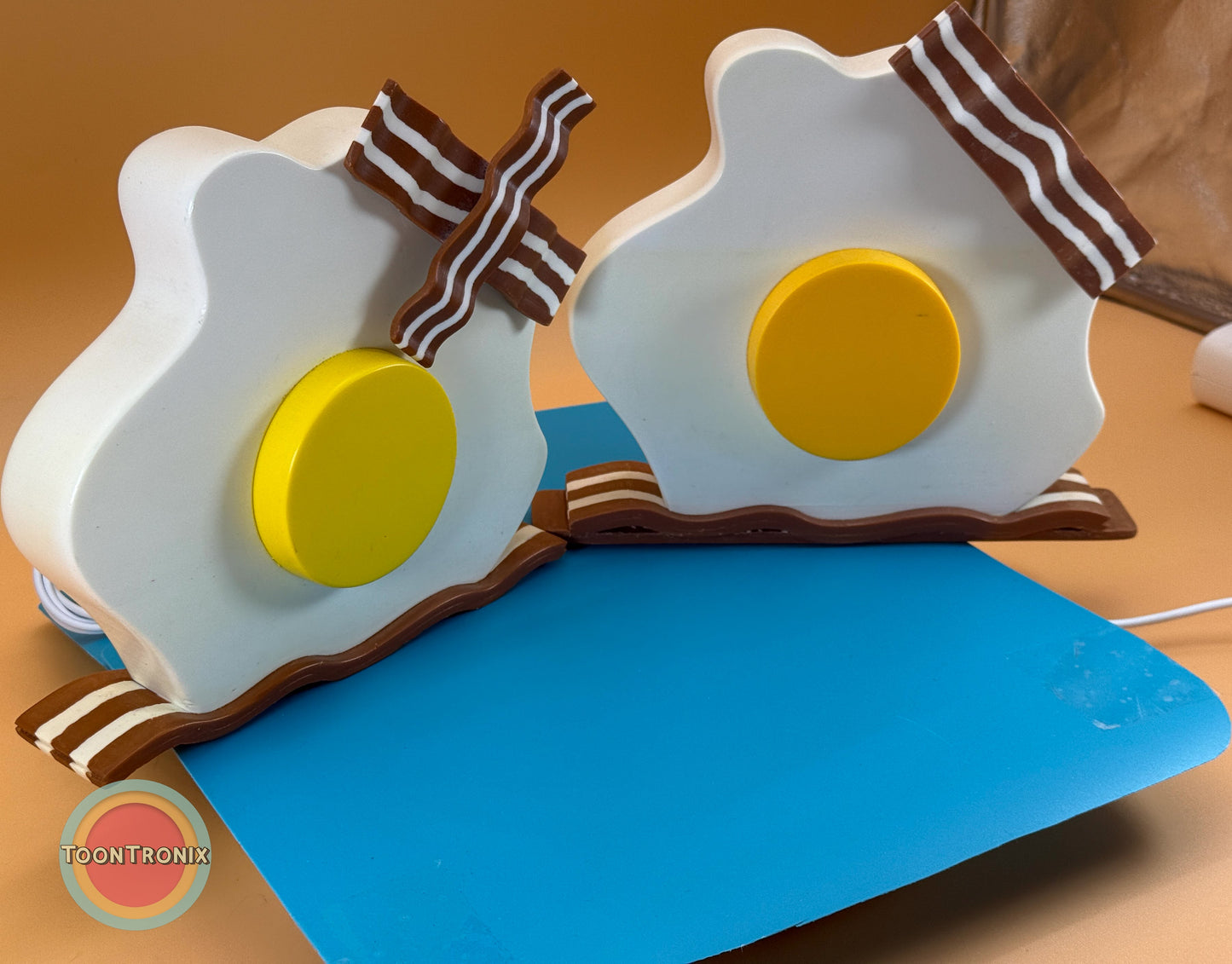 6" and 9" cartoon-style eggs and bacon USB desk lamps with LED night light and wood-like finish
