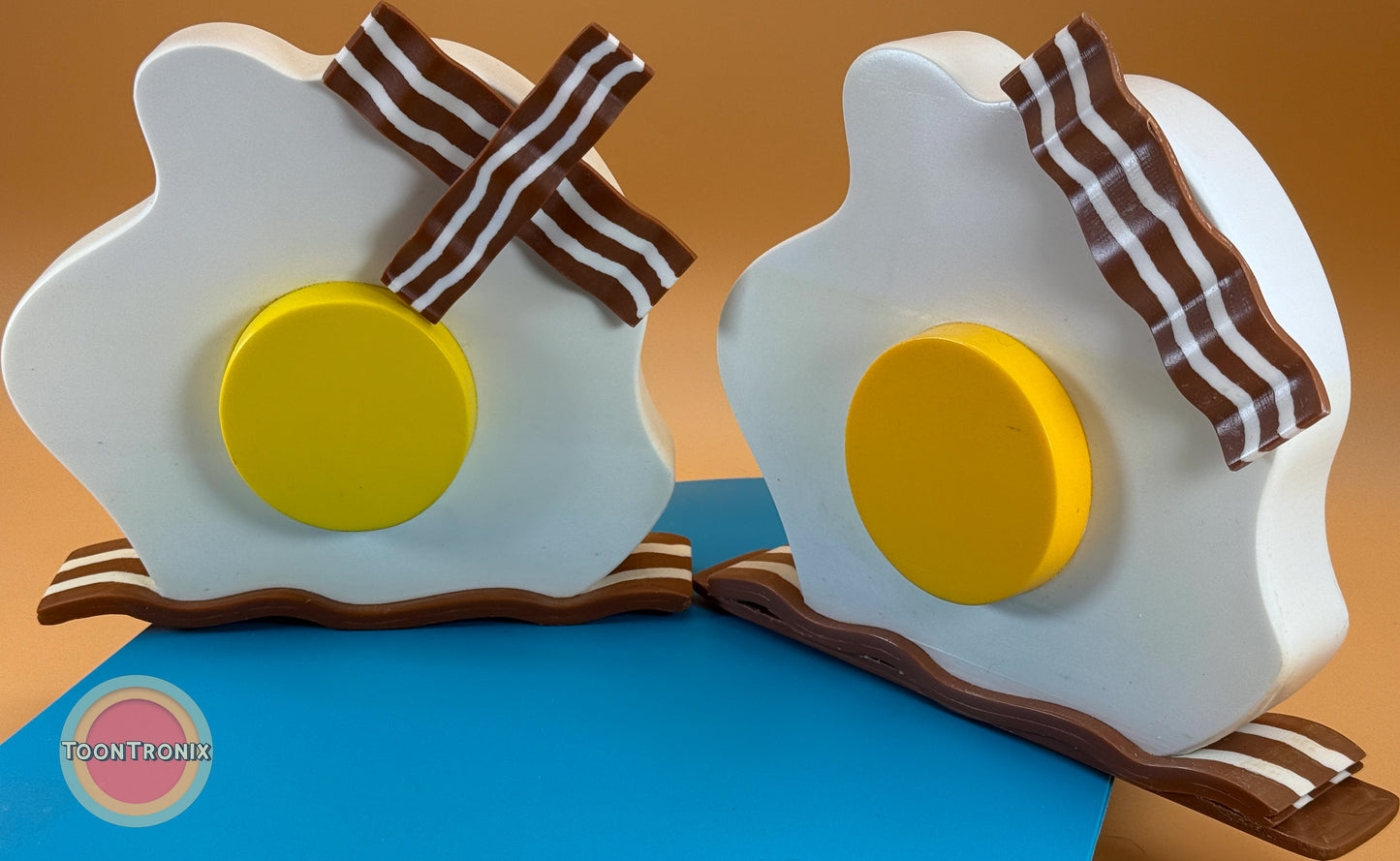 Eggs & bacon cartoon style USB desk lamp with LED light and wood finish in 6 and 9 inch sizes.