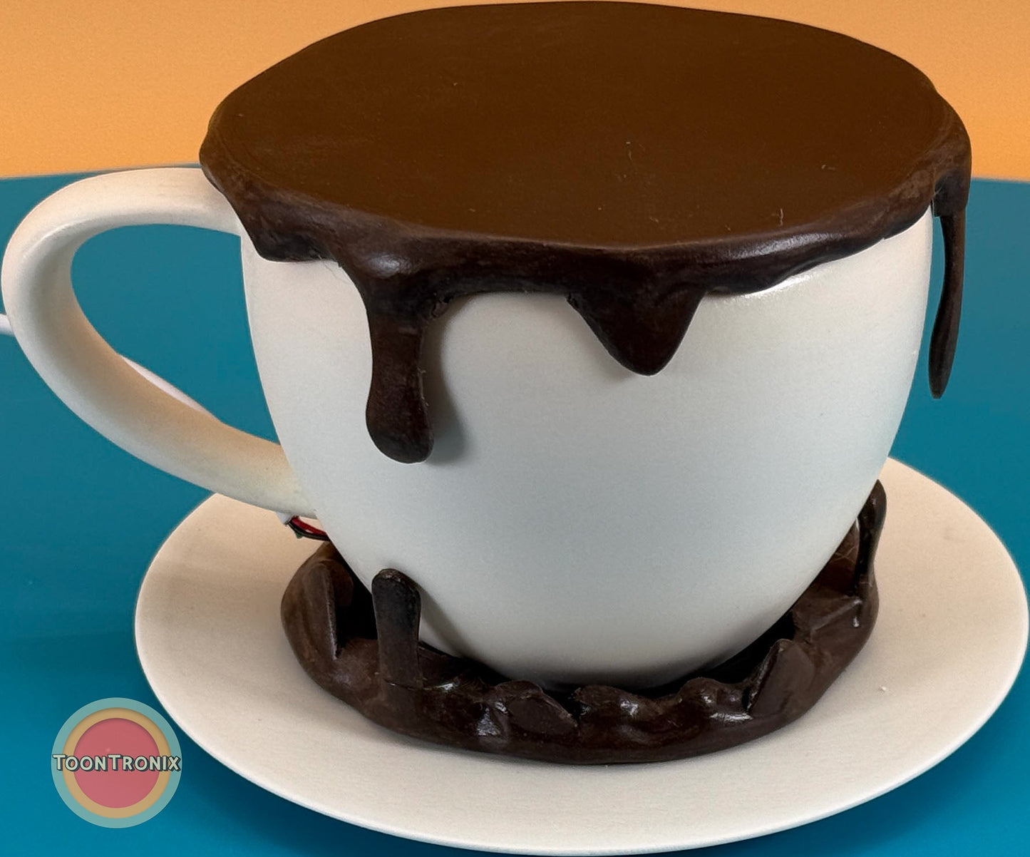 6" or 9" coffee desk lamp shaped like a white cup with dark brown dripping top and base on a white saucer