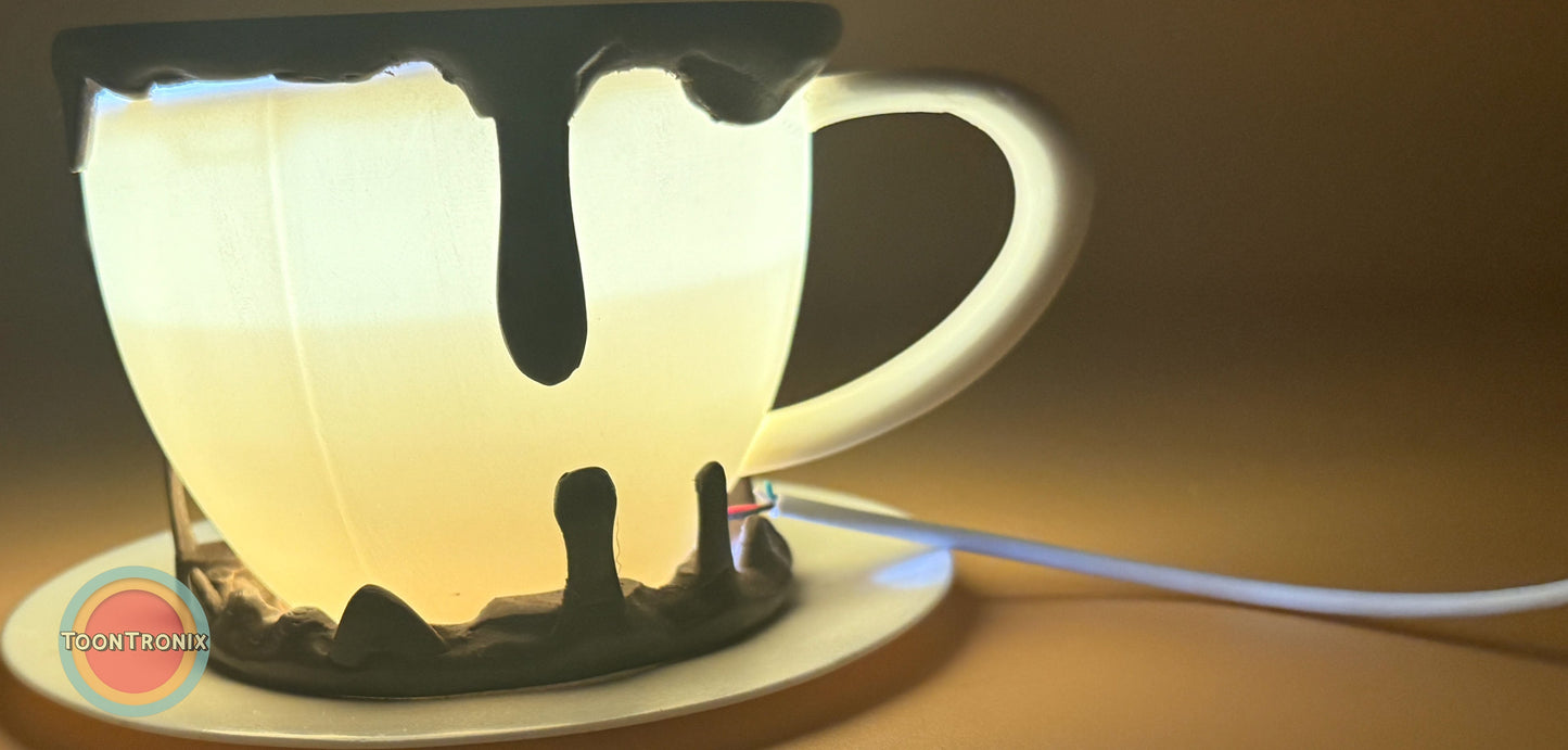 6" or 9" coffee cup shaped desk lamp with glowing warm light and built-in USB power cord