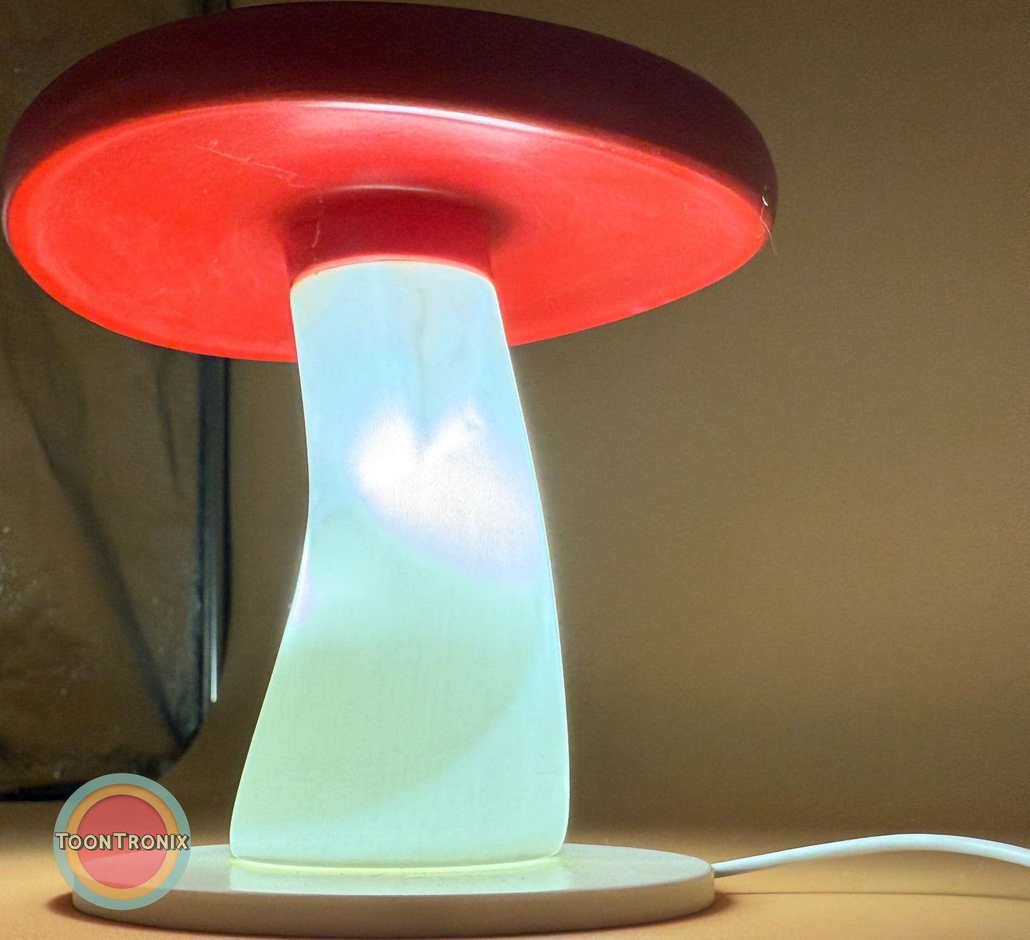 6 or 9 inch mushroom-shaped desk lamp with red cap and glowing white stem, USB powered, retro cartoon style