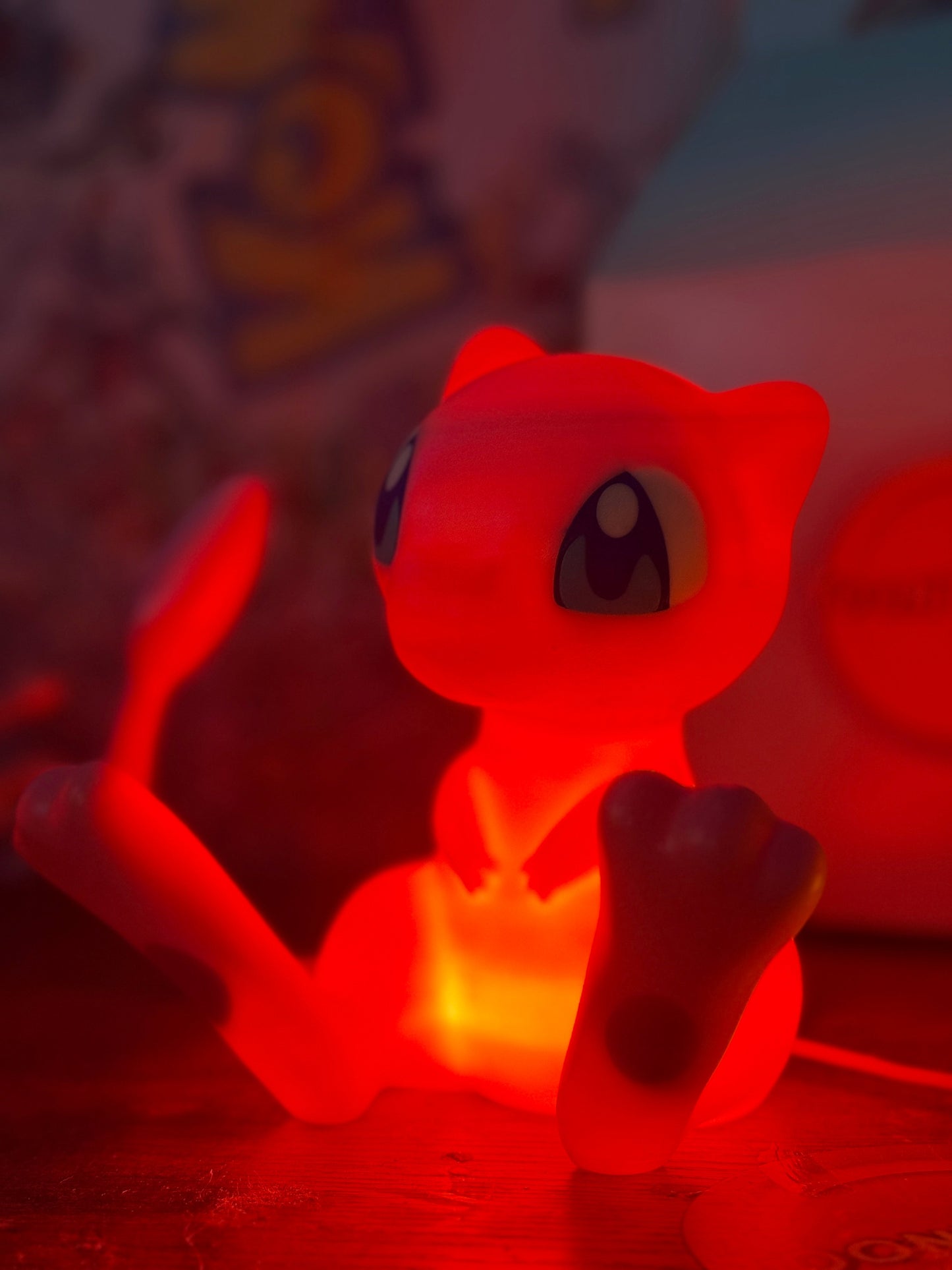 6" tall 11" wide Mew Pokemon statue USB desk lamp with red LED light and wood-like finish