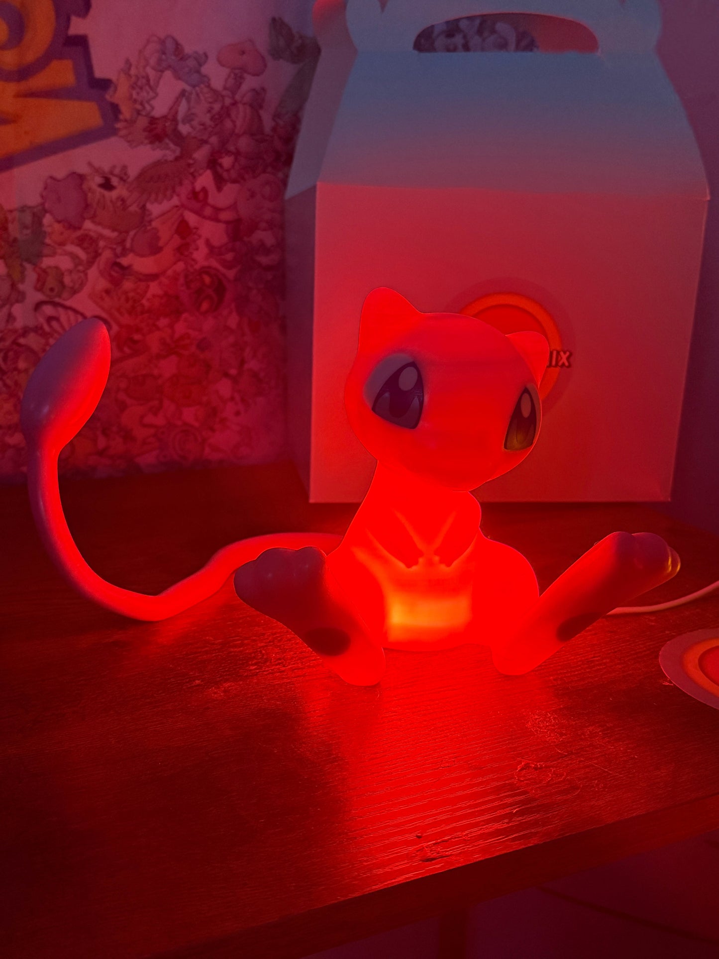 6 inch tall 11 inch wide Mew Pokemon LED desk lamp with USB cord illuminated in red light