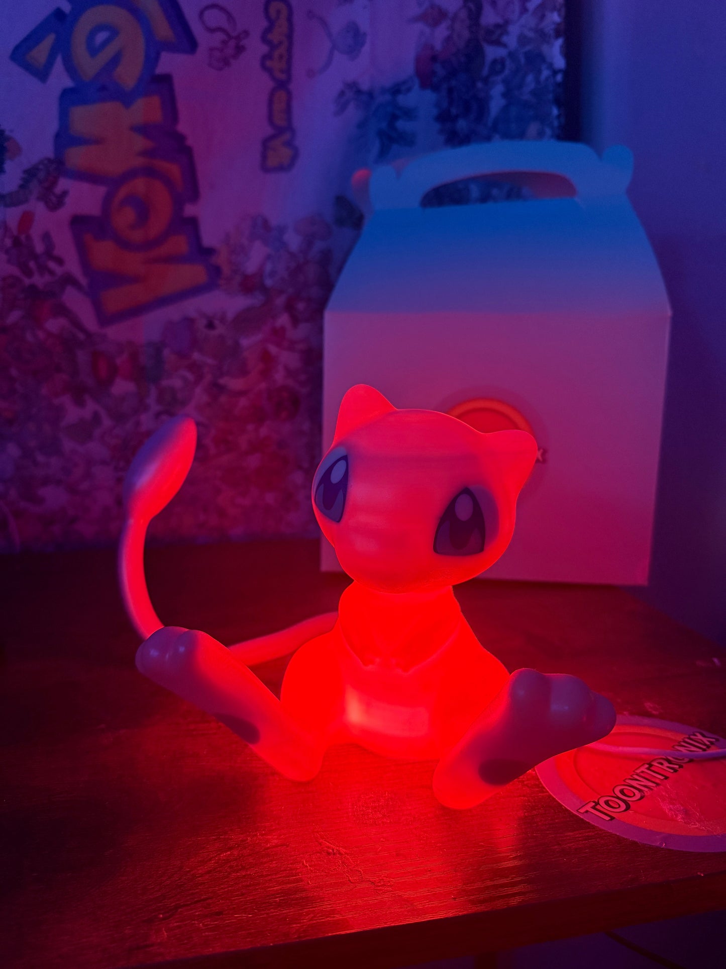 6 inch tall Mew Pokemon statue USB desk lamp with red LED light and wood-like finish