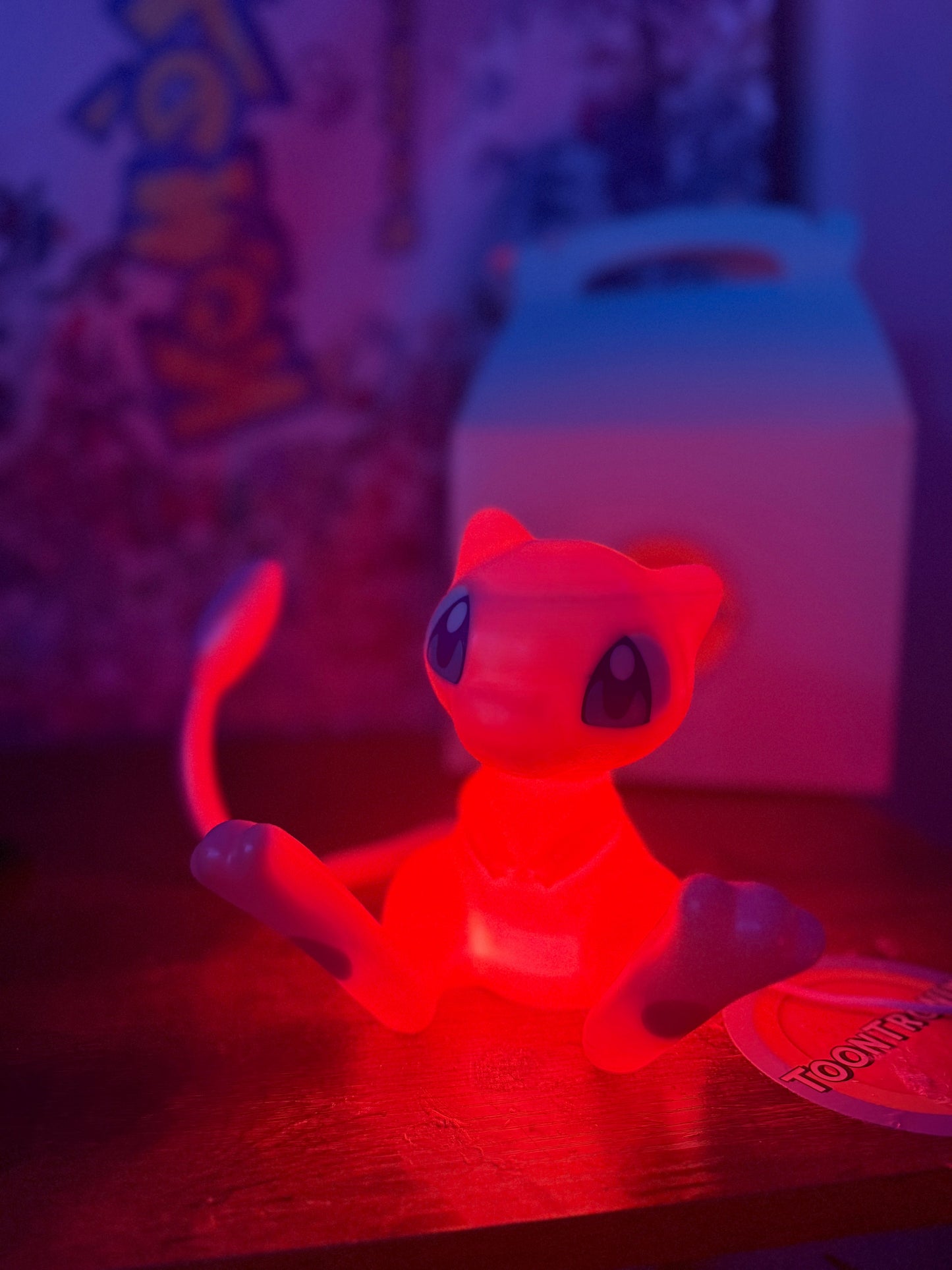 6" tall Mew Pokemon LED desk lamp with built-in USB and wood-effect finish, glowing red light