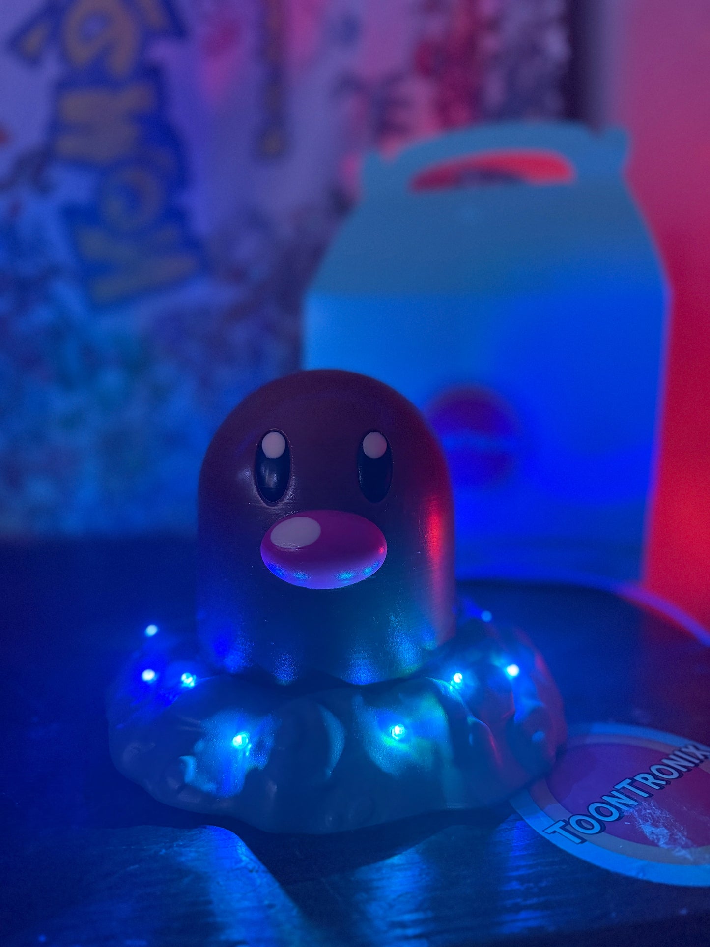 6" tall Diglett Pokemon LED desk lamp with USB cord and wood-like finish glowing blue