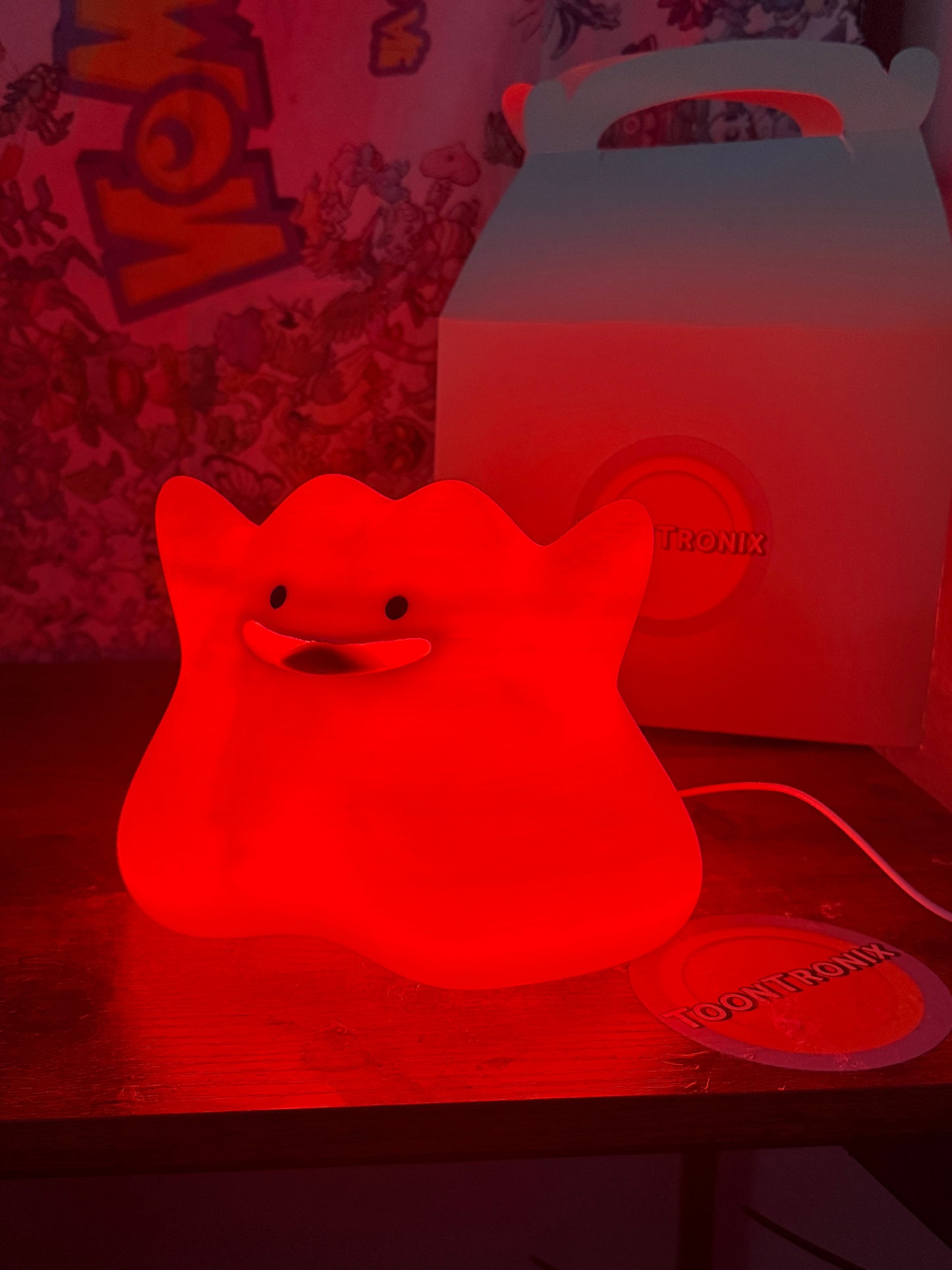 6" Ditto Pokemon statue desk lamp glowing red with built-in USB cord and wood-like finish
