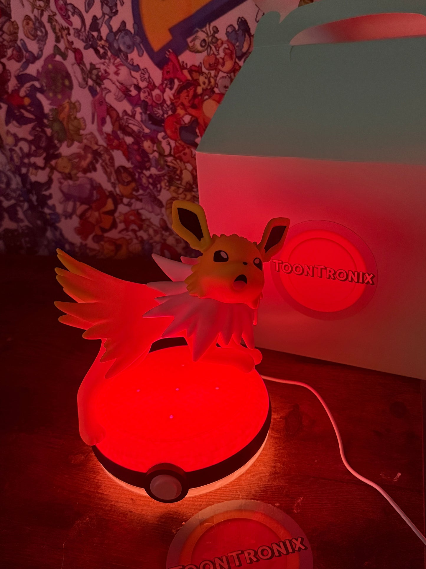 7" Jolteon Pokeball USB LED desk lamp with glowing red light and Toontronix branding
