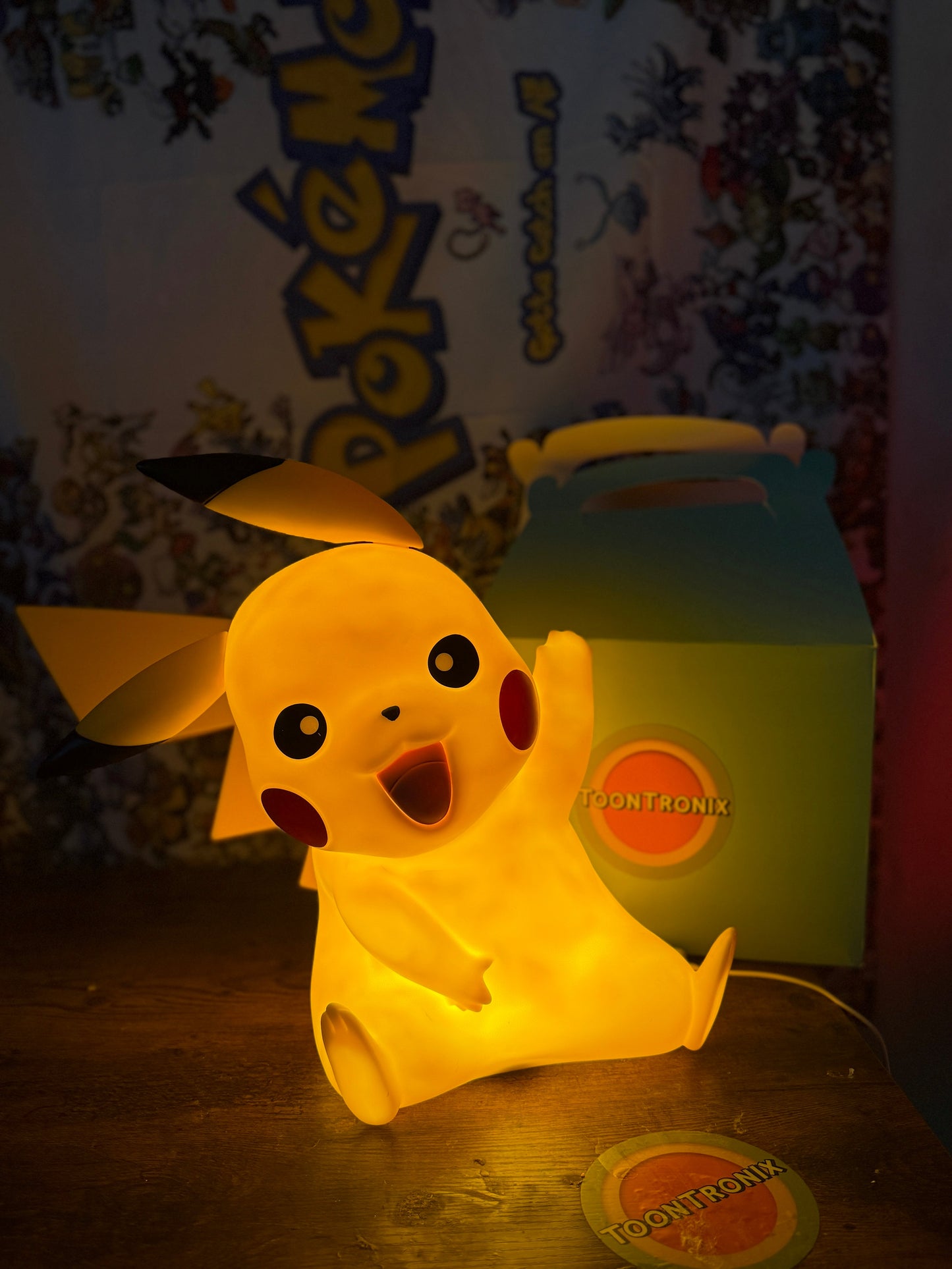 13" Pikachu large statue LED desk lamp glowing yellow with USB cord and Pokemon background