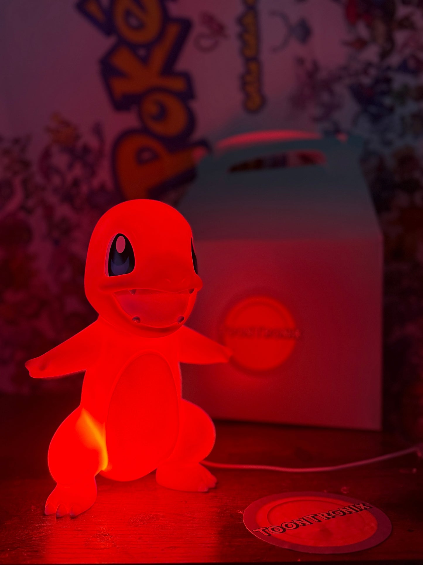 9" Charmander Statue USB desk lamp glowing red with Pokemon background and packaging