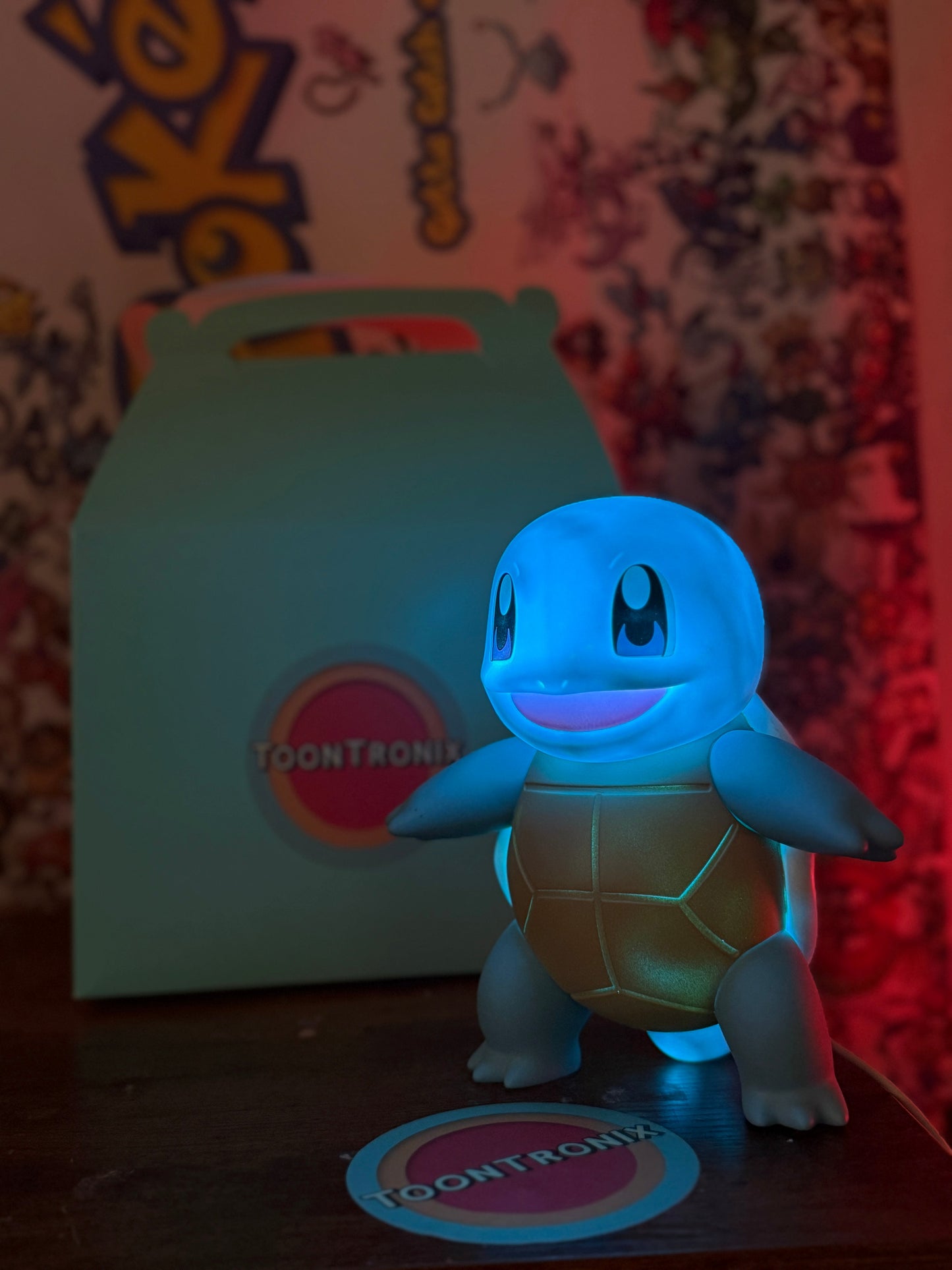 7.8" Squirtle Statue LED desk lamp with built-in USB cord glowing blue in a dark room