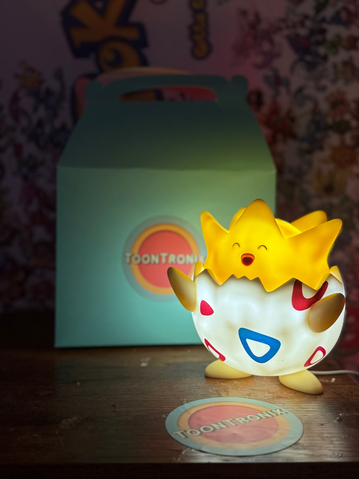 7" Togepi Statue Pokemon LED USB Desk Lamp Light on wooden surface with Toontronix packaging in background