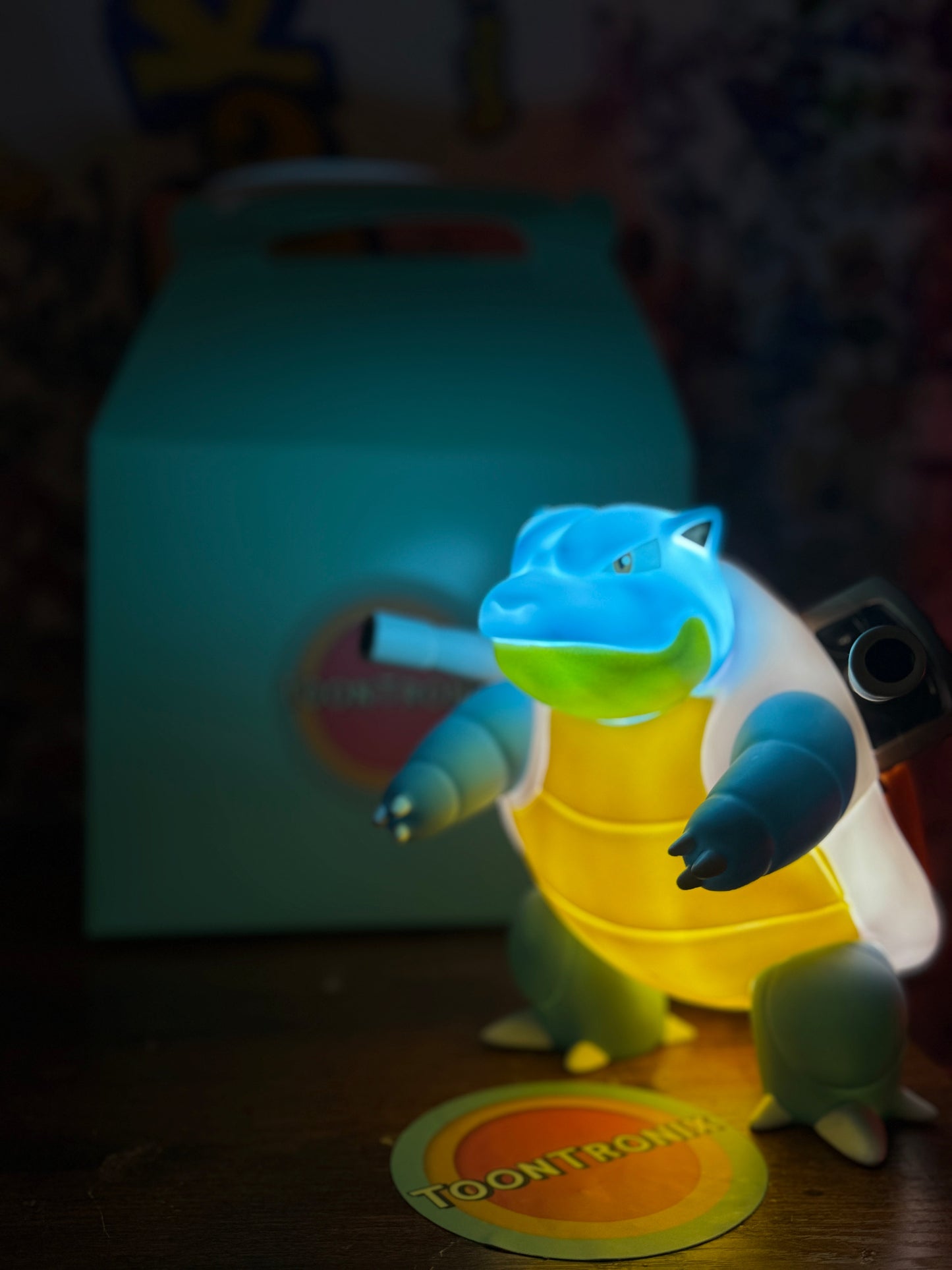 7" Blastoise Statue Pokémon LED USB Desk Lamp glowing in dim light