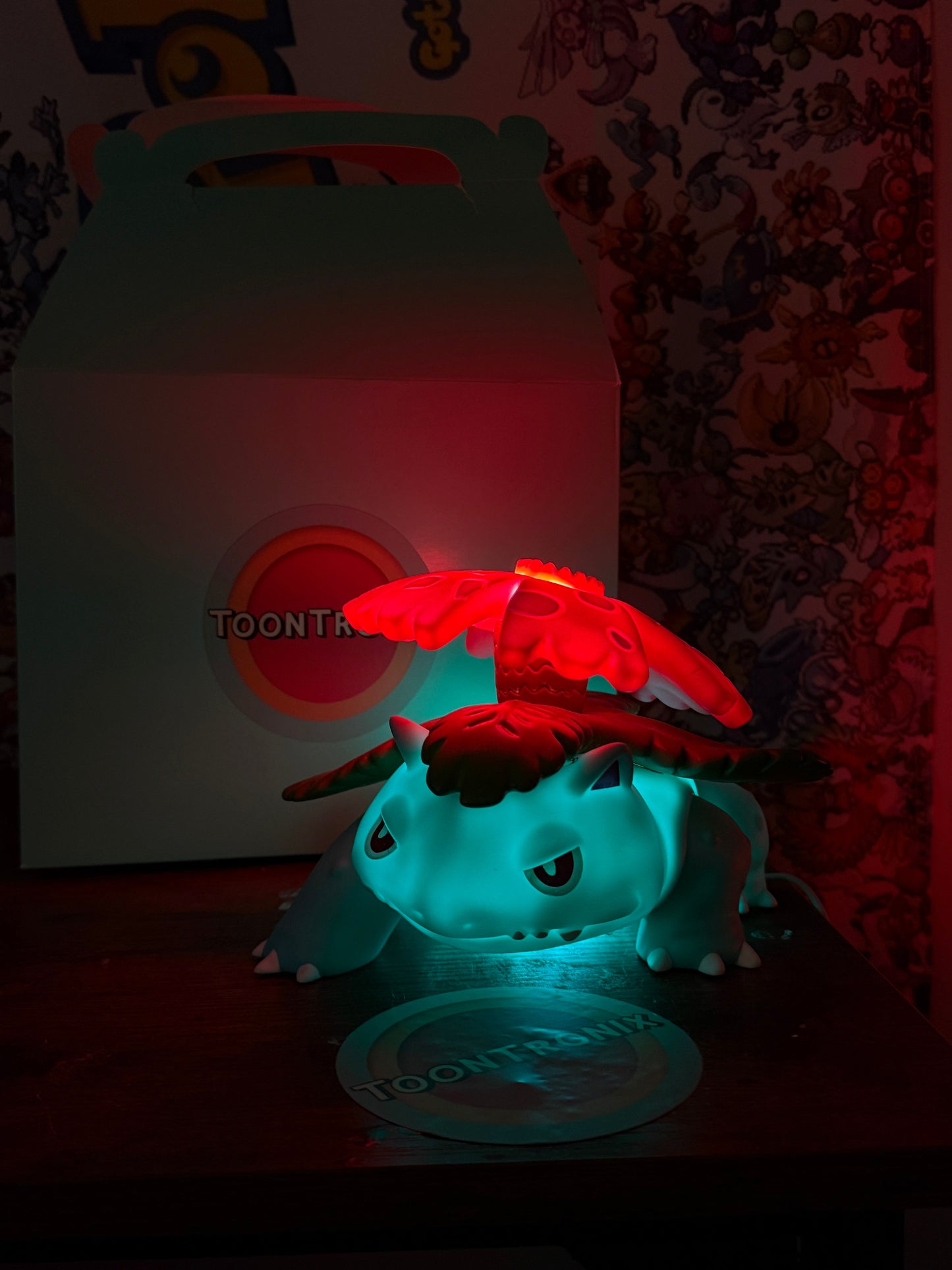5" x 7" Venusaur statue desk lamp with built-in USB LED light glowing in red and teal colors