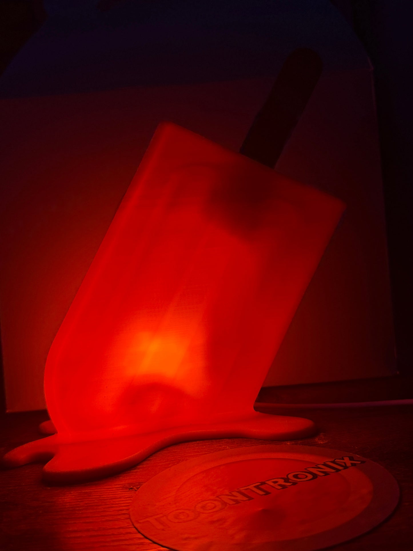 Red glowing 6-inch or 9-inch popsicle-shaped LED desk lamp with USB power and woodified finish
