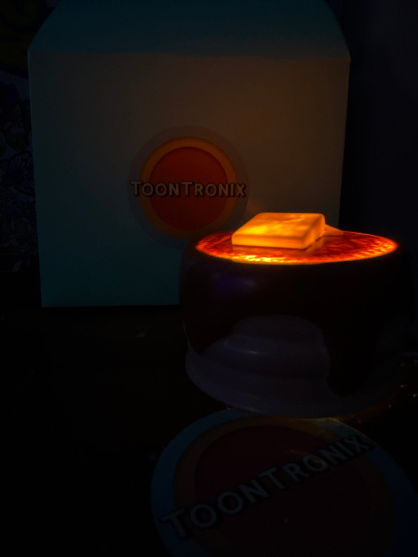 6" or 9" Pancakes Desk USB LED night light shaped like a cartoon pancake with butter on top, glowing warmly on a desk.