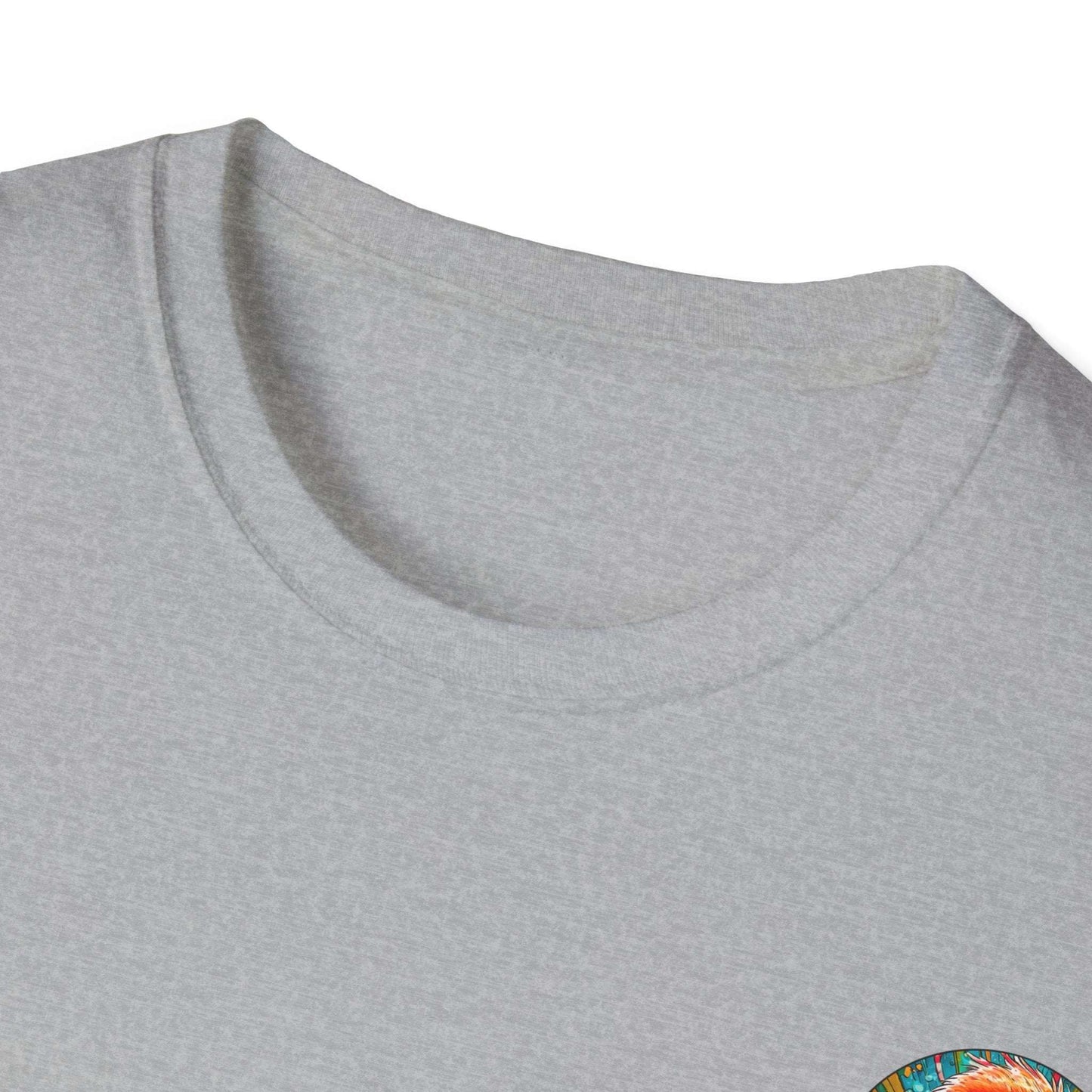 Vibrant Flamingo T-Shirt with ribbed collar on grey fabric, featuring a colorful design.