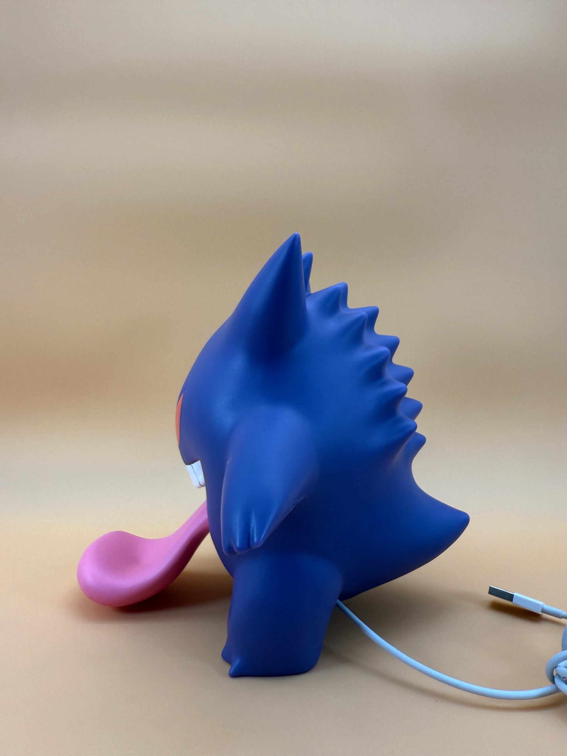 7.8" Gengar with Tongue Out Statue USB Desk Lamp in blue.
