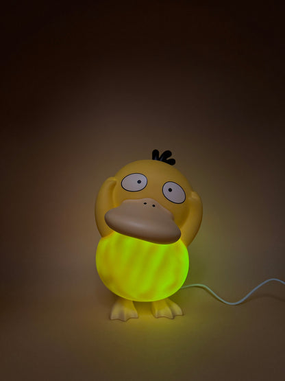 8" Psyduck Statue Desk Lamp with USB cord, glowing light.