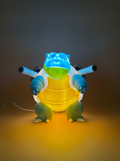 7" Blastoise Statue USB Desk Lamp Light with built-in USB cord, illuminating a space with a magical touch.
