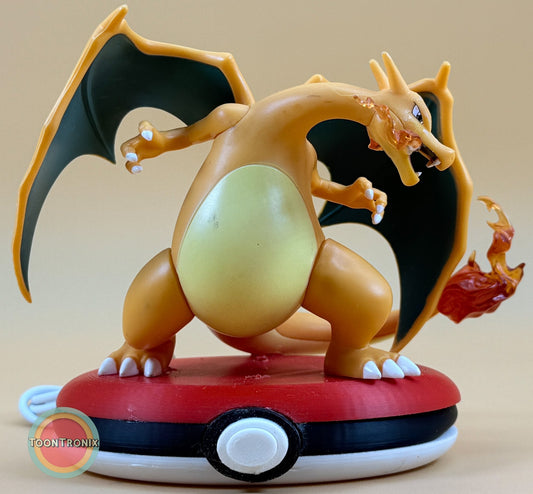 4" Charizard Pokemon statue USB desk lamp with fiery detail on Pokeball base