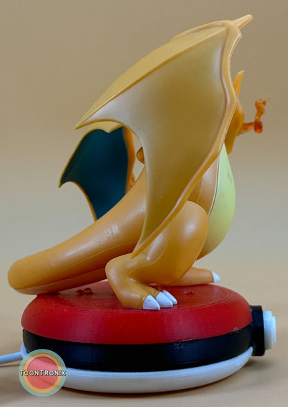 4" Charizard Pokemon statue USB desk lamp with red and white base and built-in USB cord