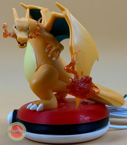 4" Charizard Pokemon statue desk lamp with flame details on red base and built-in USB cord