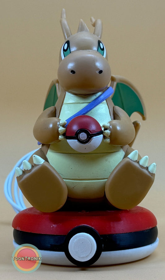5" Dragonite Pokemon statue USB desk lamp holding Pokeball on Pokeball base with built-in USB cord