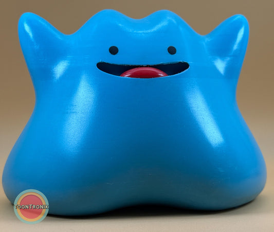 Blue 6 inch Ditto Pokemon statue USB desk lamp with built-in cord and wood-like finish