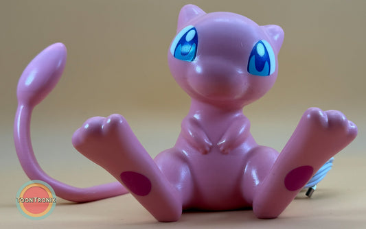 6" tall 11" wide Mew Pokemon statue desk lamp with built-in USB cord and wood-like finish