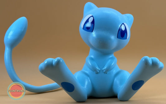 6" tall 11" wide shiny Mew Pokemon statue desk lamp with USB cord and wood-like finish