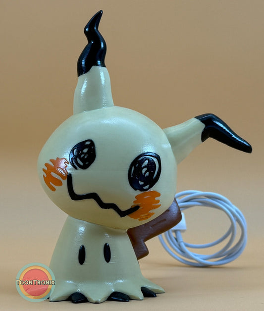6" Mimikyu Pokemon statue USB desk lamp with wood-like finish and built-in USB cord.