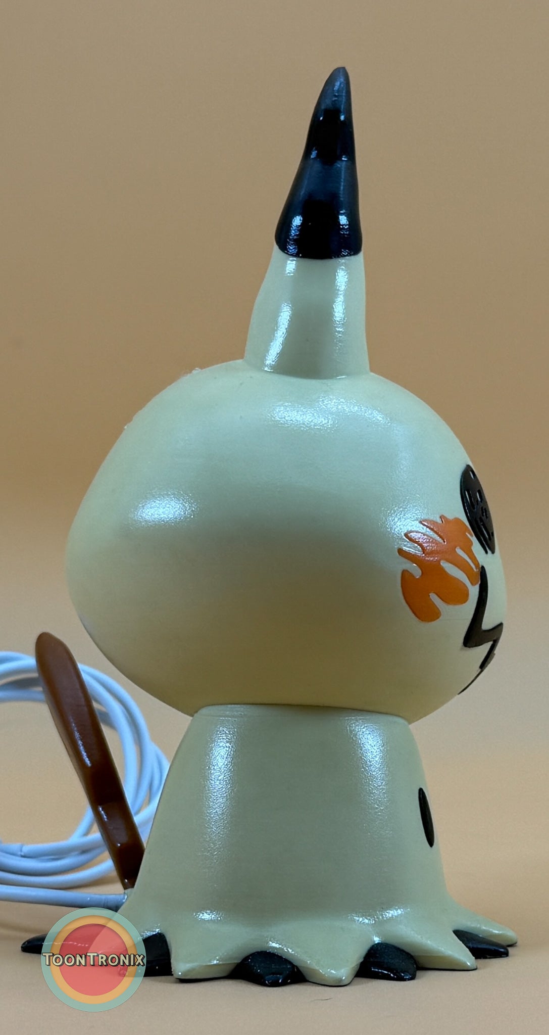 6" Mimikyu Pokemon statue desk lamp with USB cord and wood-like finish