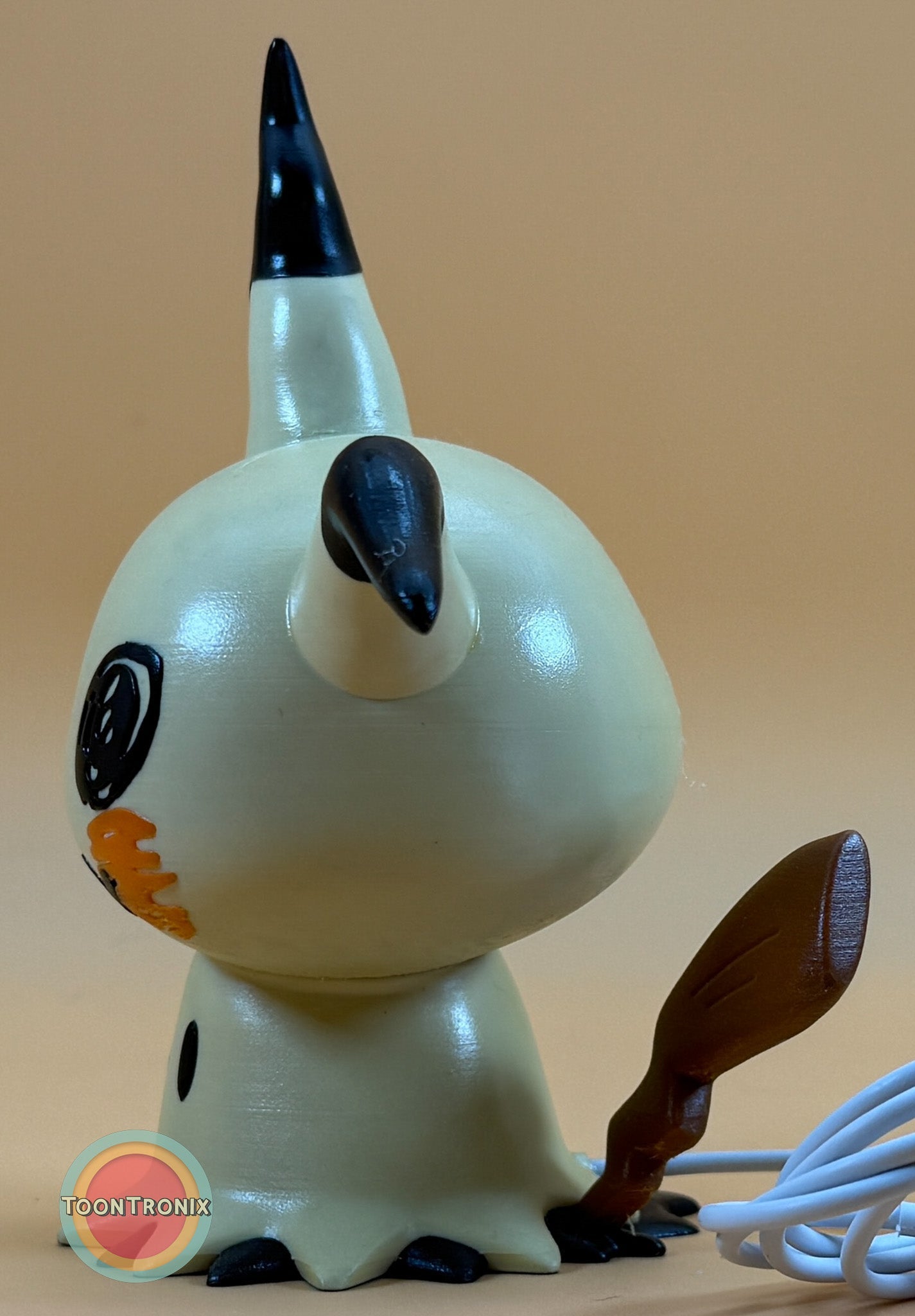 6" Mimikyu Pokemon statue desk lamp with built-in USB cord and wood-like finish