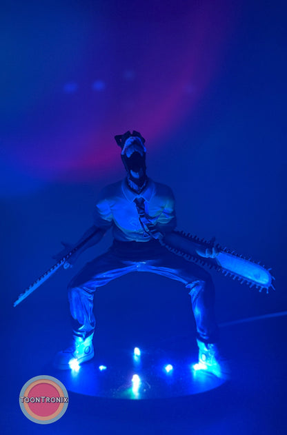 5" Chainsaw Man statue USB desk lamp glowing with blue light and chainsaw arms in dynamic pose