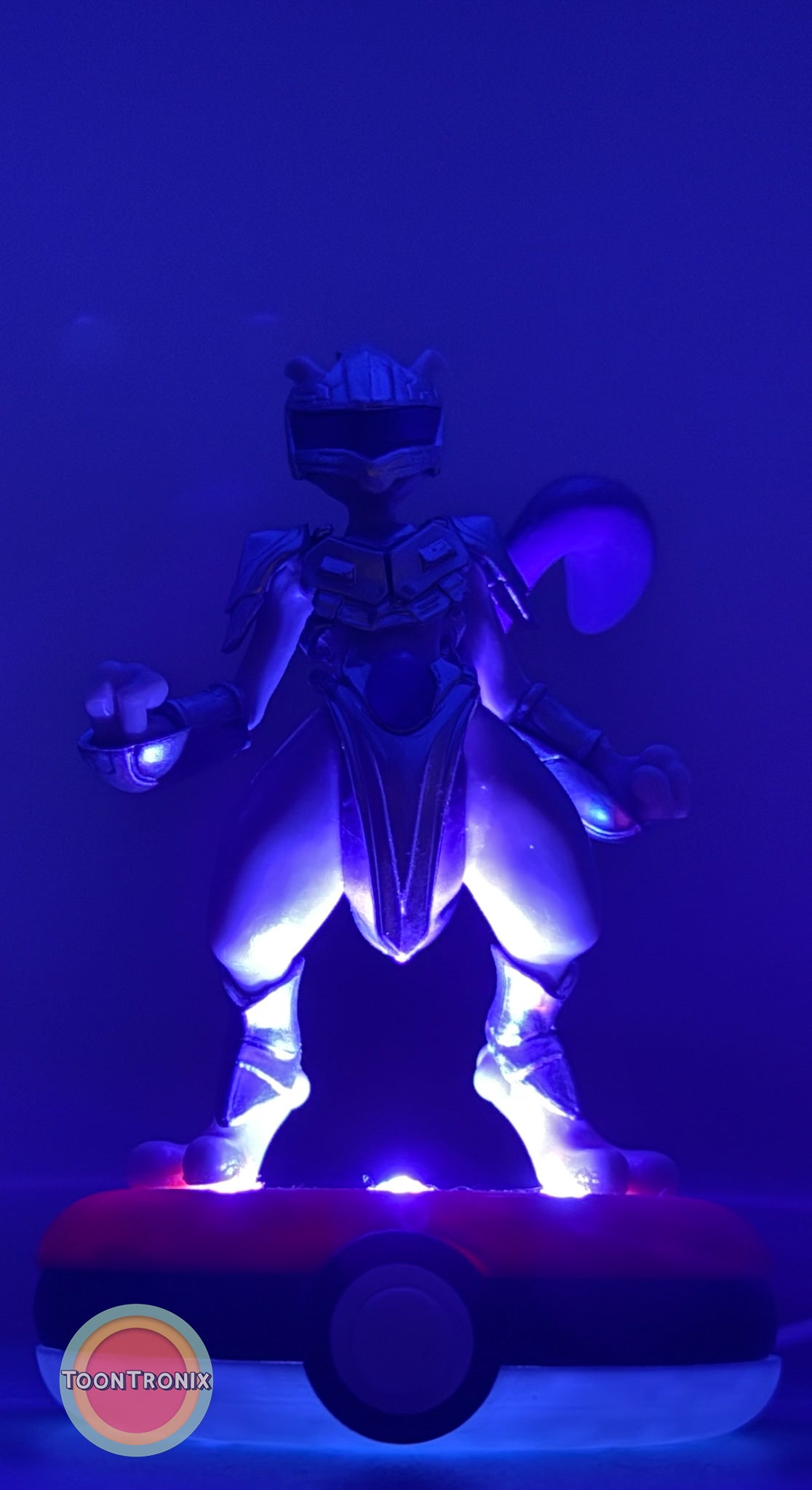 5" Mewtwo Pokemon statue USB desk lamp glowing purple on Pokeball base