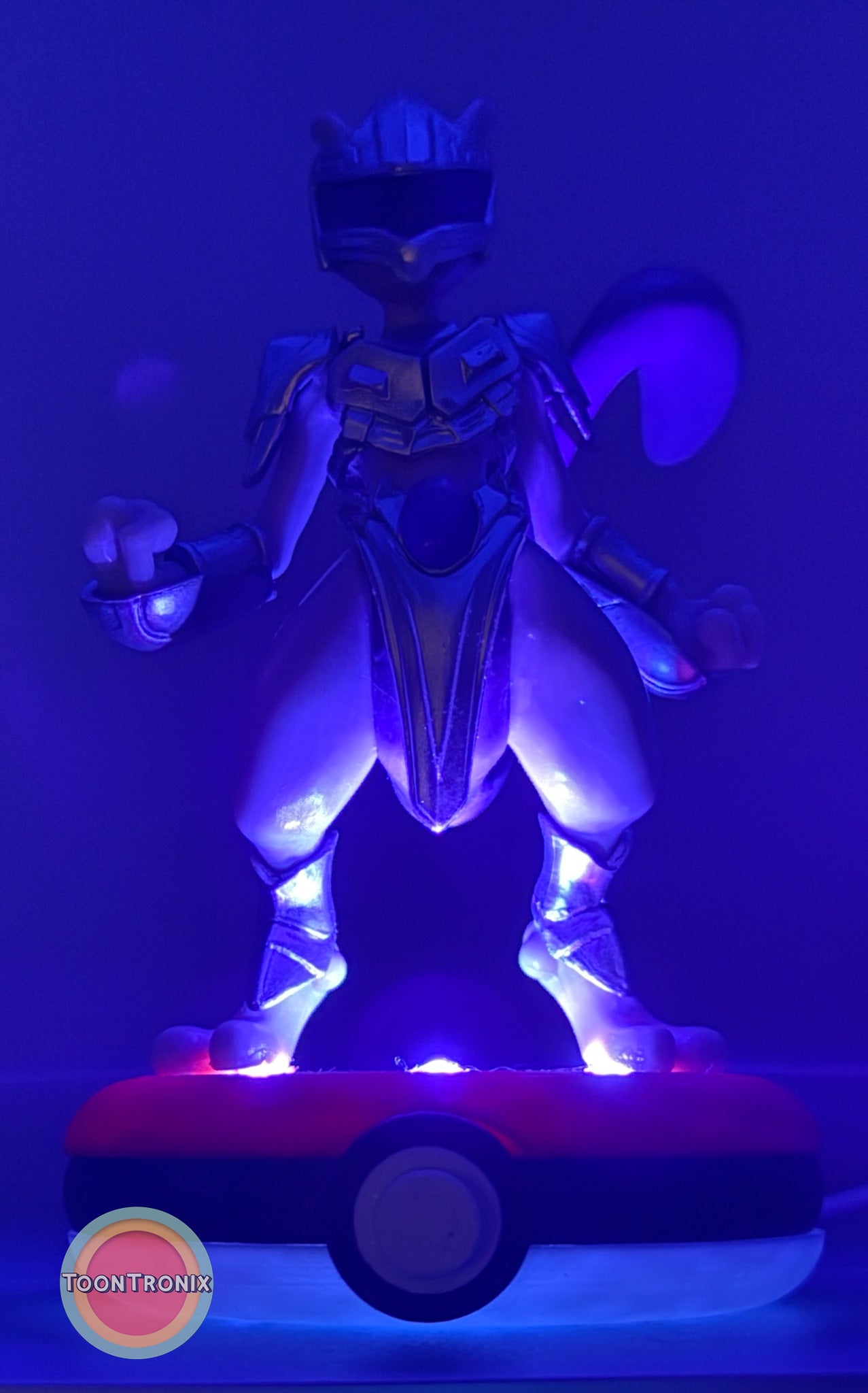 5" Mewtwo Pokemon statue USB desk lamp glowing purple on Pokeball base