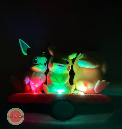 3" Eevee Pikachu Psyduck Friends Pokemon statue USB desk lamp glowing with multicolor light on a dark background