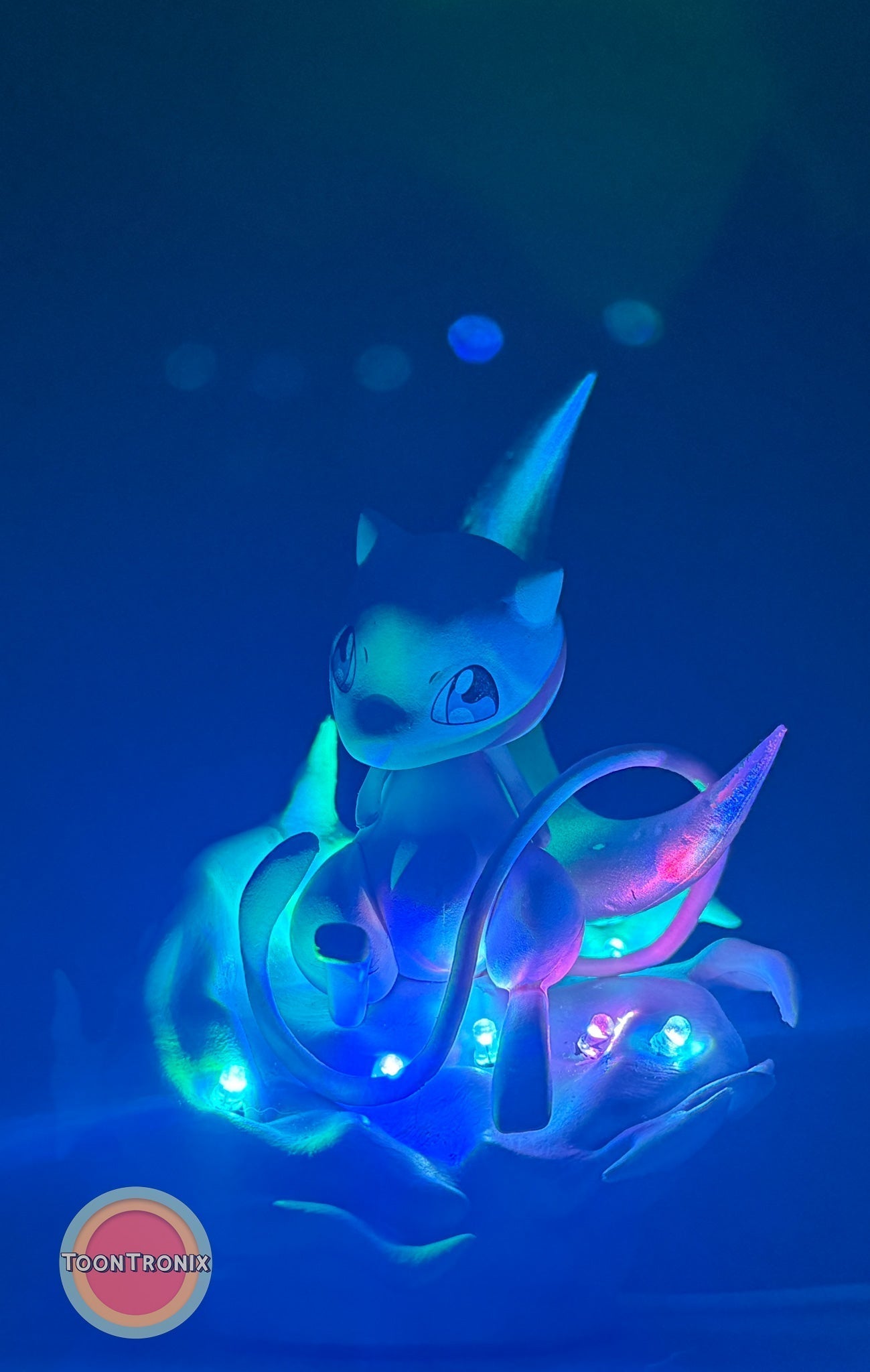 5" Mew Pokémon statue USB desk lamp glowing with blue and purple lights