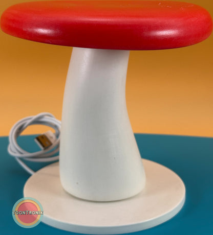6" or 9" mushroom-shaped desk lamp with red cap and white stem, featuring built-in USB cord for power, retro cartoon style design