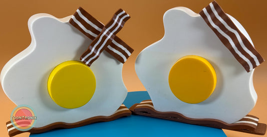 Cartoon style eggs and bacon desk lamp light with USB power, available in 6 or 9 inches tall.