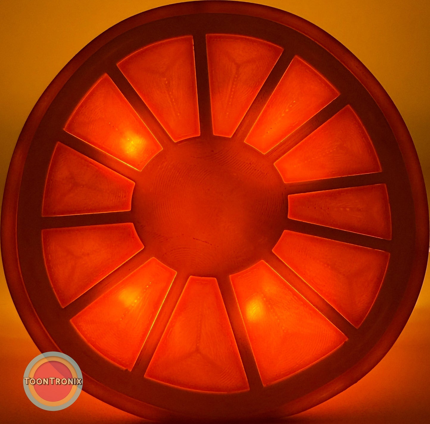 Orange desk food lamp shaped like a glowing orange slice with vibrant retro design and woodified finish