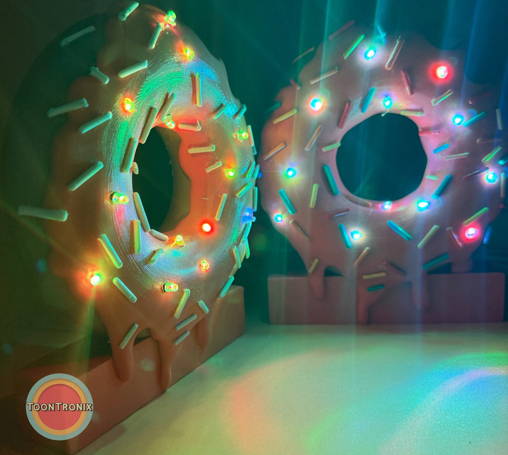 6 or 9 inch donut-shaped desk lamp with colorful sprinkles and vibrant LED lights on a stand